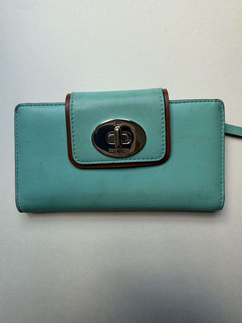 Kate Spade Turquoise Wallet with Brown Trim and Gold Turn-Lock
